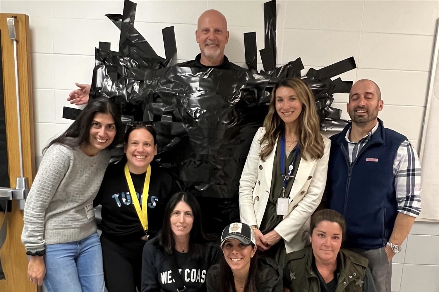   Principal stuck to wall